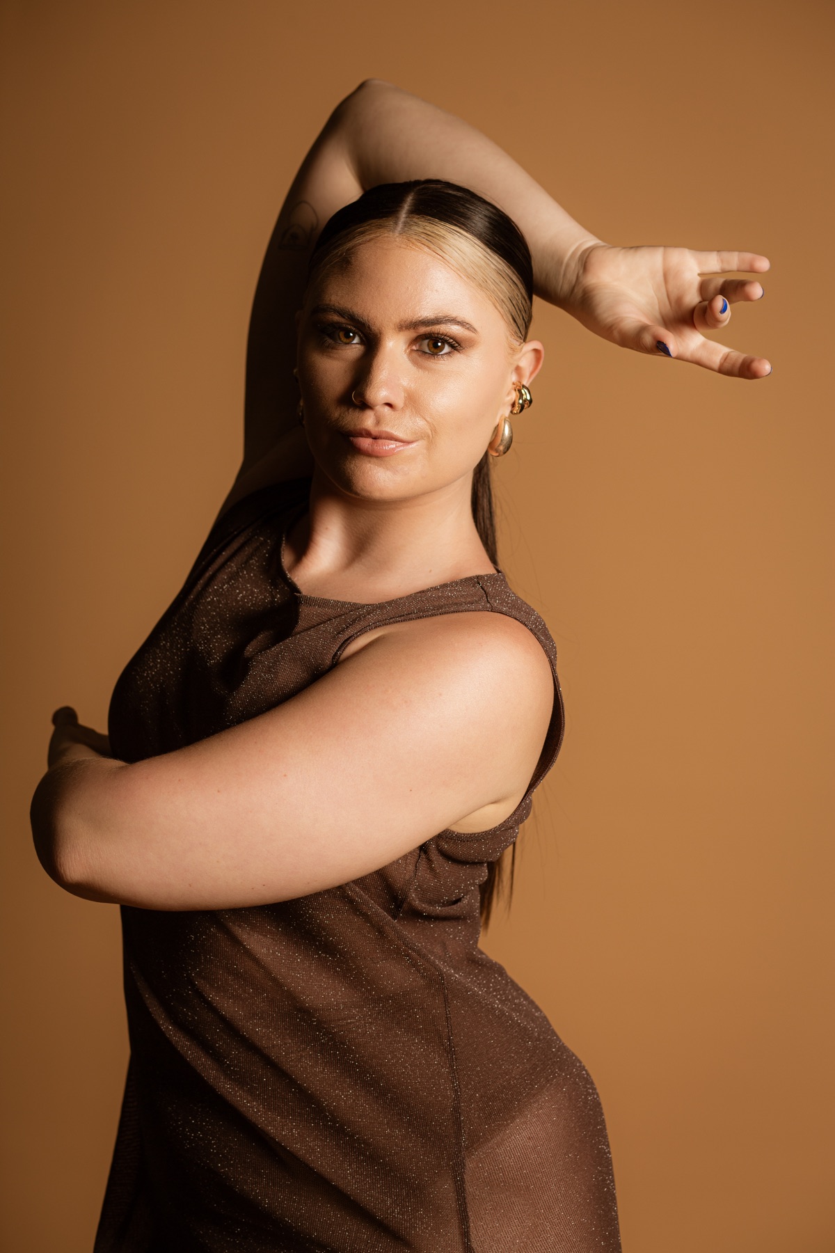 Suzie Searight holding an angular choreographic pose